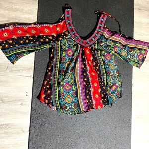 Multicolor V neck hand made with back self tie blouse. Perfect for any occasion